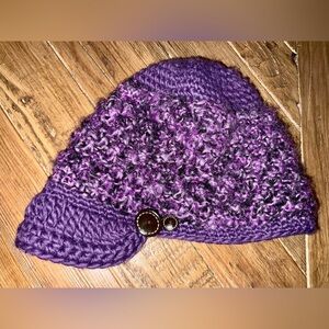 Turtle Fur Newsboy hat in purple crochet with button accents for adults
